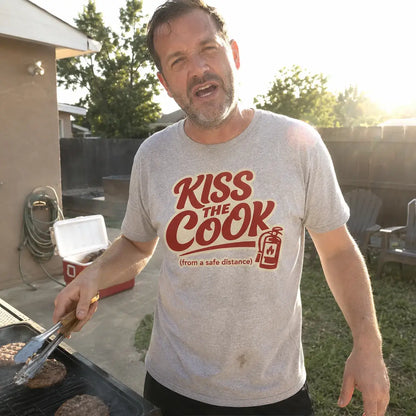 Kiss The Cook T-Shirt — Retro Red Graphic Tee ("Kiss The Cook from a safe distance")