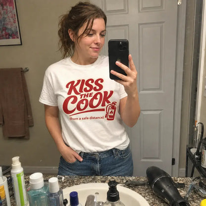 Kiss The Cook T-Shirt — Retro Red Graphic Tee ("Kiss The Cook from a safe distance")
