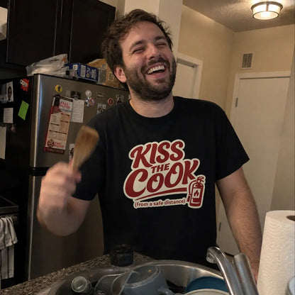 Kiss The Cook T-Shirt — Retro Red Graphic Tee ("Kiss The Cook from a safe distance")