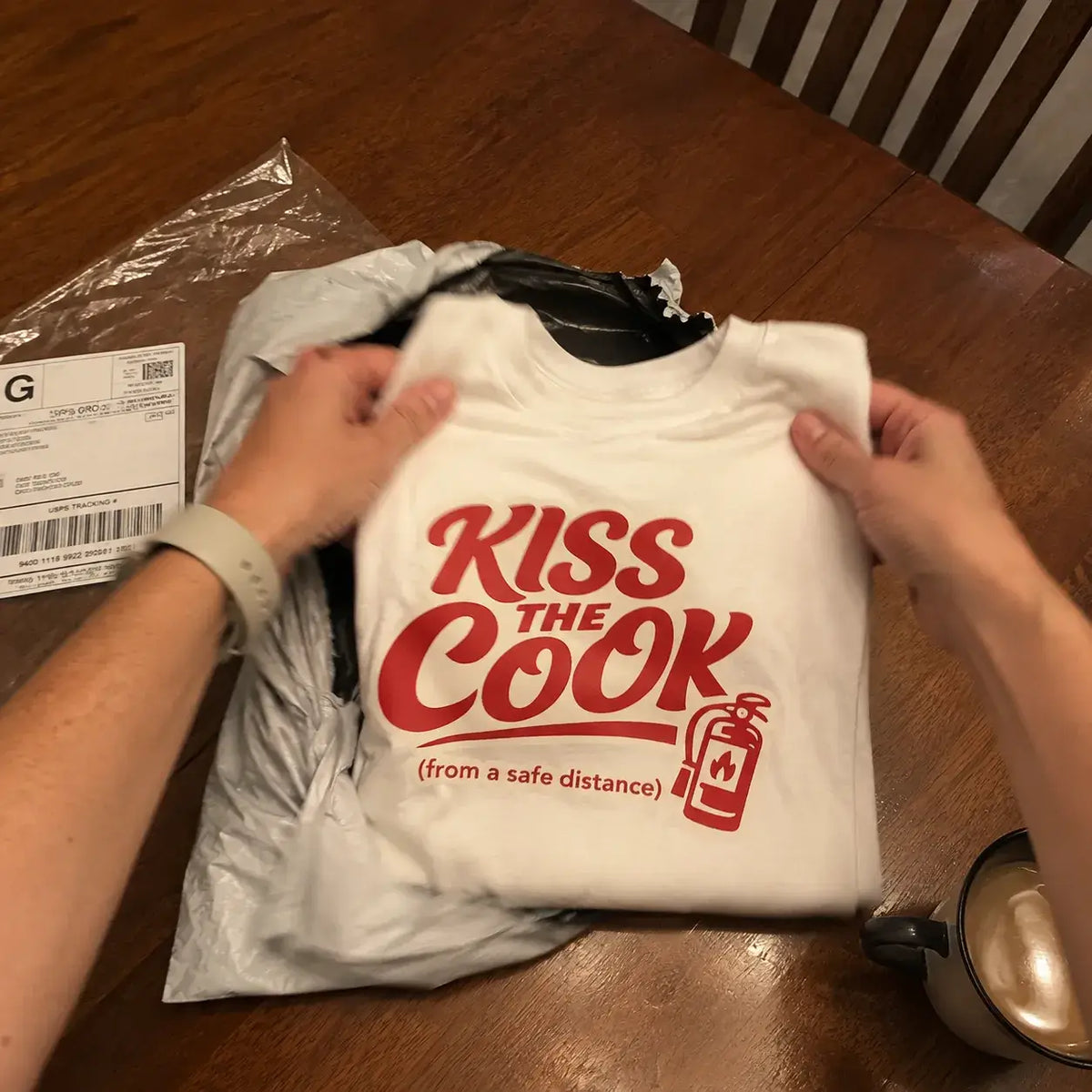 Kiss The Cook T-Shirt — Retro Red Graphic Tee ("Kiss The Cook from a safe distance")