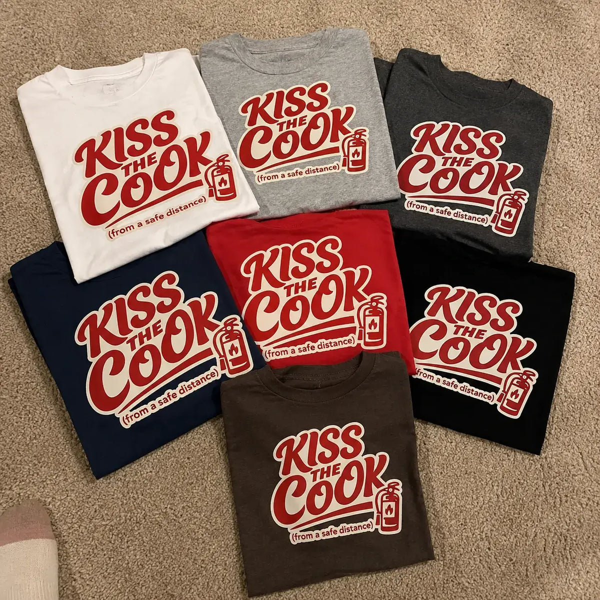 Kiss The Cook T-Shirt — Retro Red Graphic Tee ("Kiss The Cook from a safe distance")